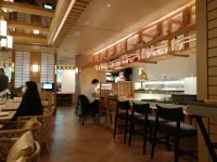 QUE (New Town Plaza)